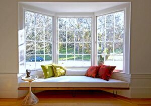 A beautiful bay window with a seating area.