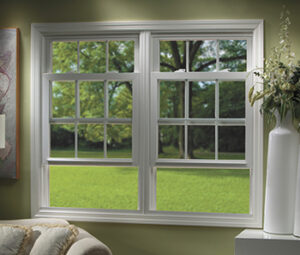 A pair of double-hung windows in a living room.